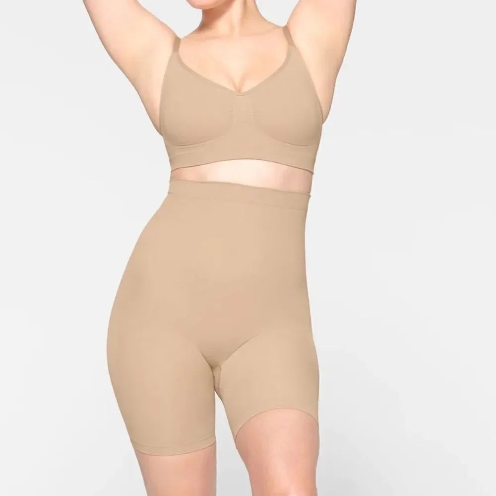 SKIMS Seamless Sculpt High Waist Mid Thigh Shorties Shaping Shorts In Clay Nude